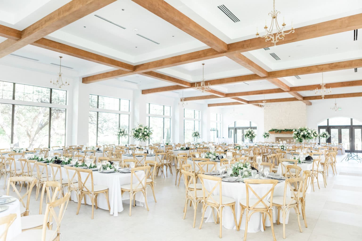 Wedding Venue Ballroom and Reception Hall ready decorated with flowers and candles